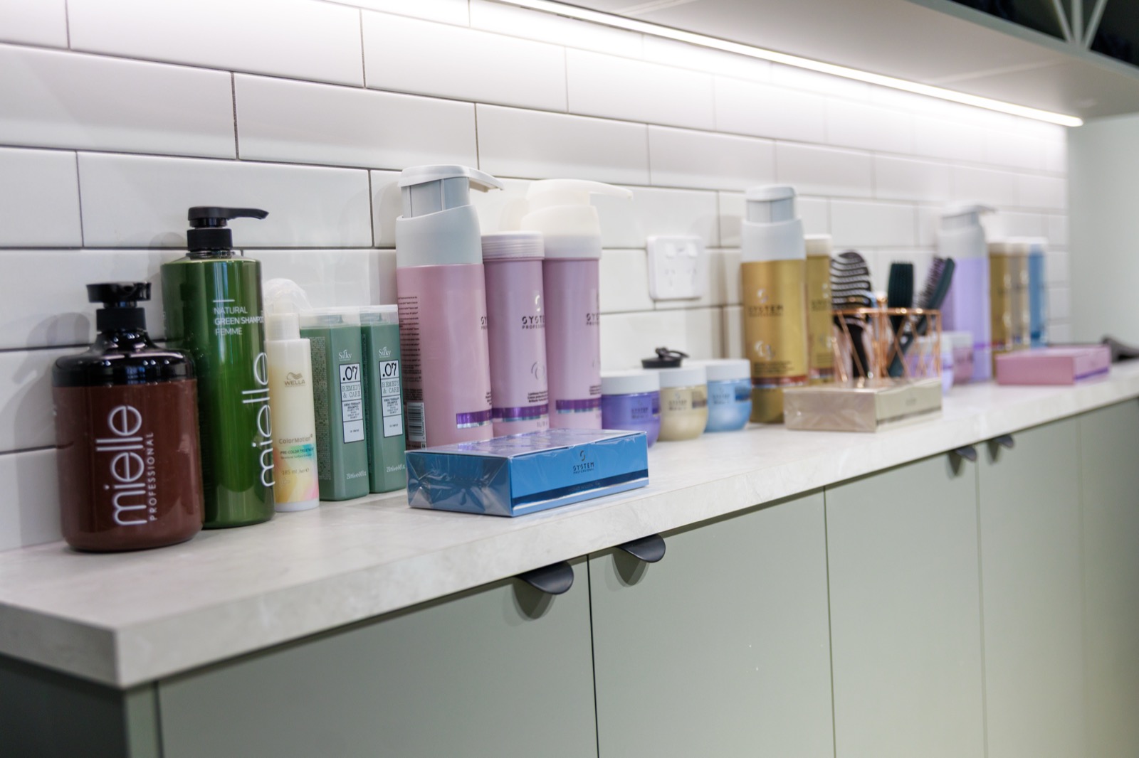 Wella products on the counter at Hair Avenue Braddon